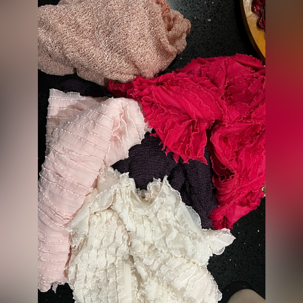 Lot of swaddling blankets for new born photo shoot